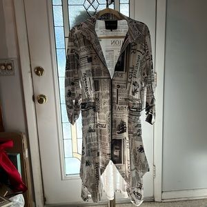 Black and white newspaper print Jacket. Light weight.